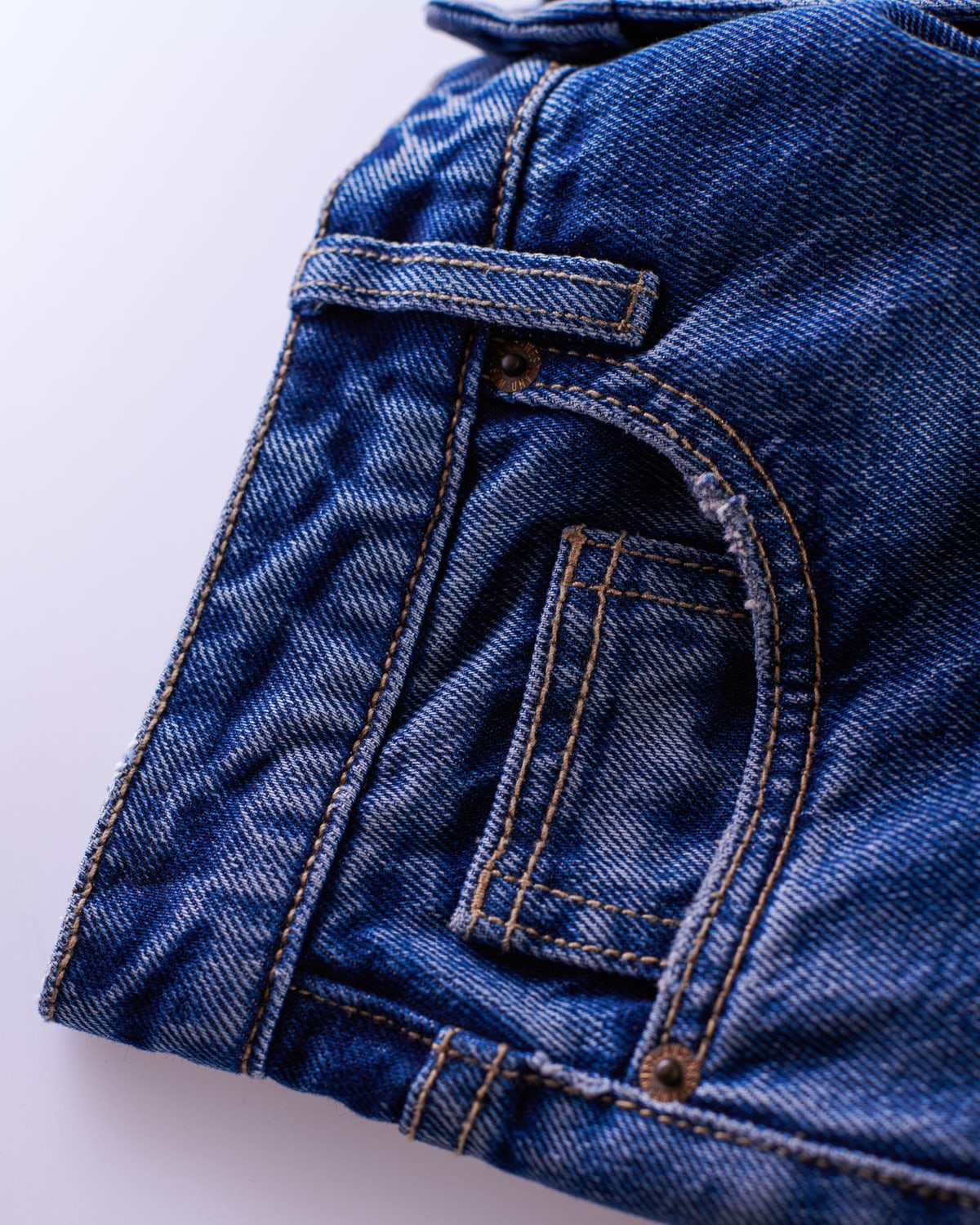 Woman wearing high-waisted denim in an everyday setting