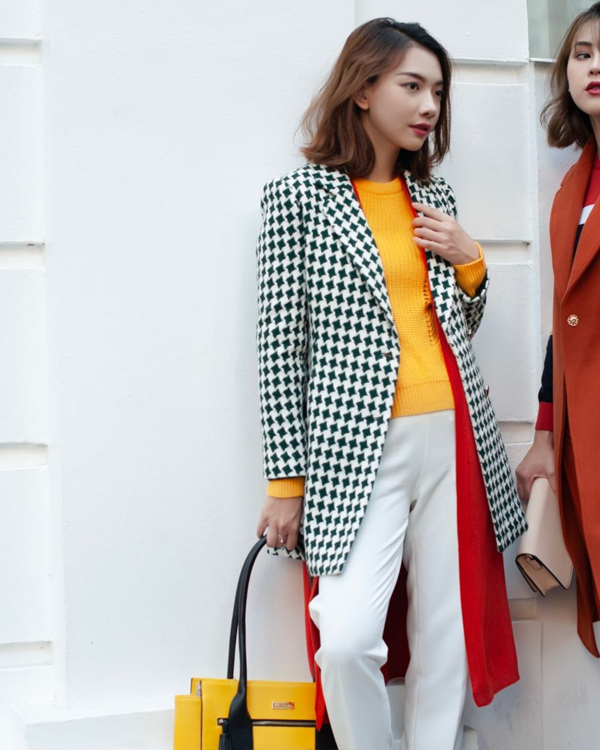 Woman wearing a structured leather jacket