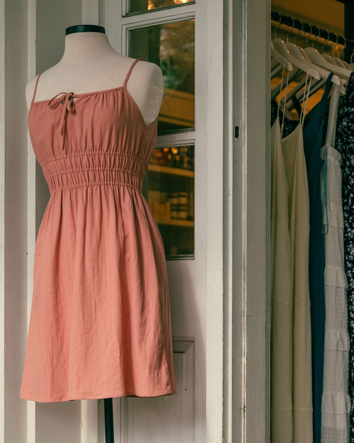 Woman wearing a simple midi dress in natural daylight